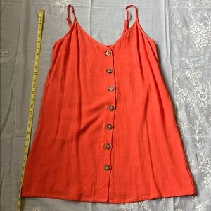 Pink Lily mini dress with pockets & adjustable spaghetti straps. Women’s small